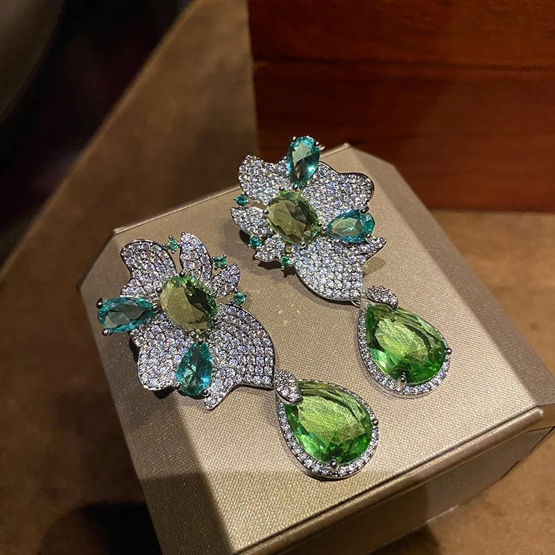 Green dangling earrings